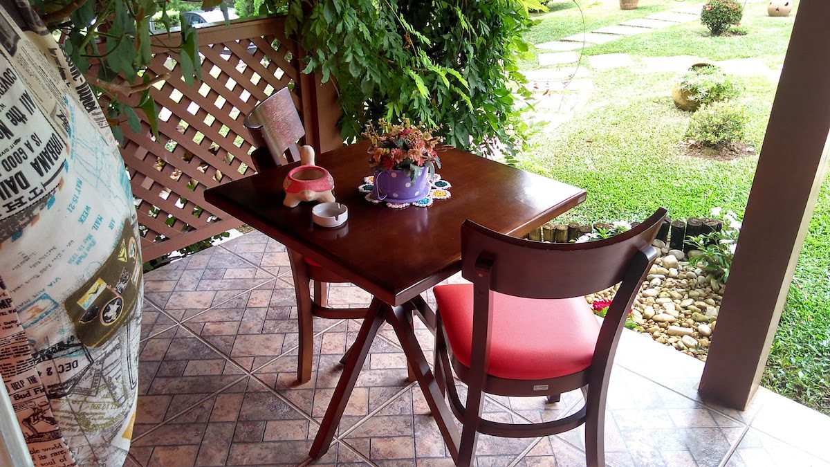 Varanda em pousada no centro de Monte Verde