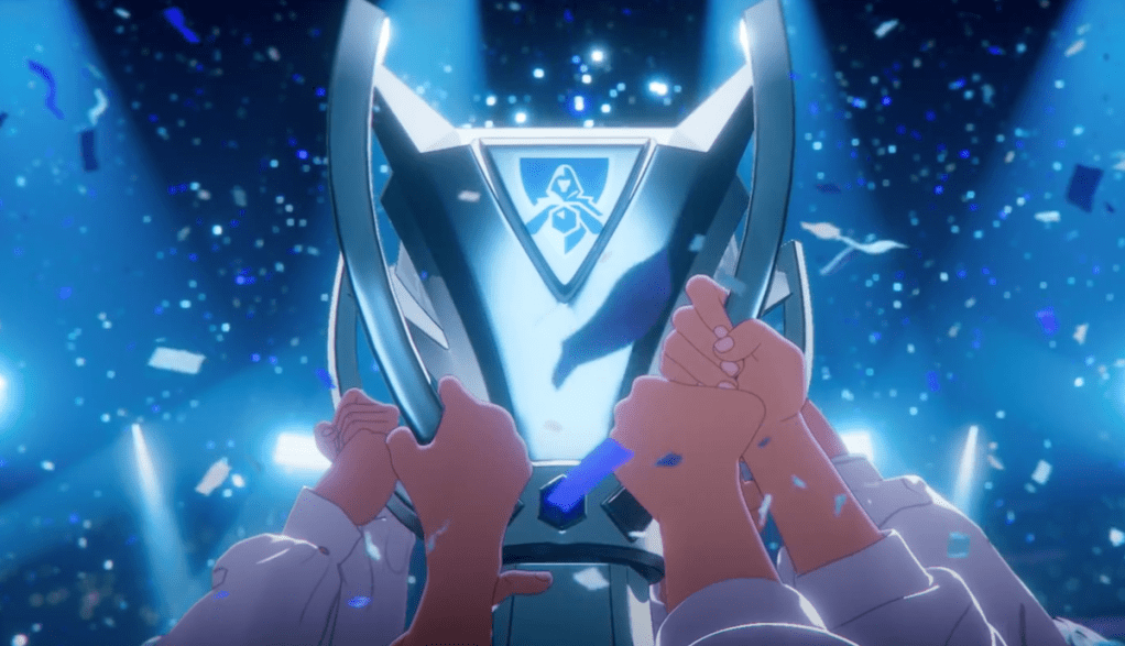 Cena do MV de "GODS", hino do Campeonato Mundial de League of Legends de 2023, levantando o troféu de campeão