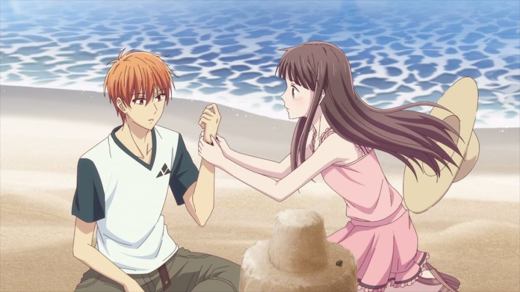 Cena de Fruits Basket 2019 com Tohru e Kyo na praia