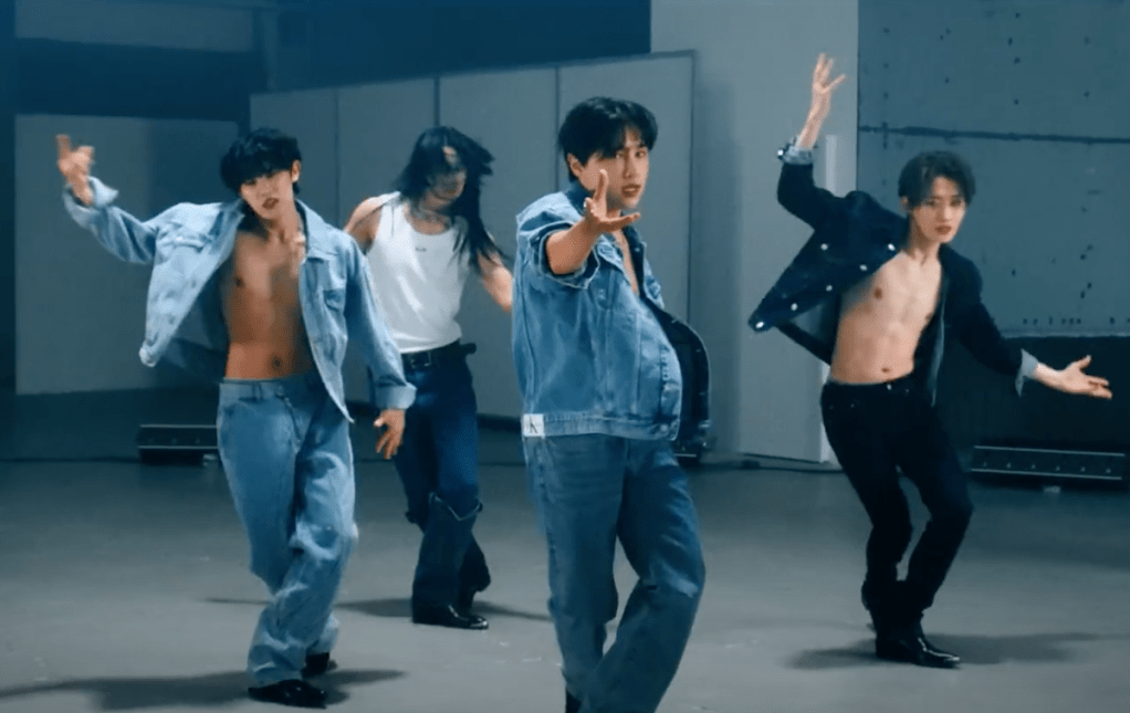 Cena do MV de "dOpamine" do álbum Things I Can't Say I Love com os membros do OnlyOneOf dançando