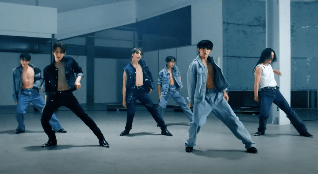 Cena do MV de "dOpamine" do álbum Things I Can't Say I Love com os membros do OnlyOneOf dançando