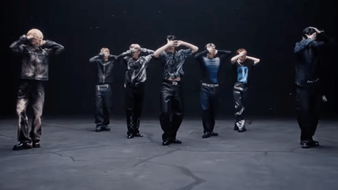 Cena do MV de "X" do álbum blackout com todos os membros do CLOSE YOUR EYES de olhos fechados